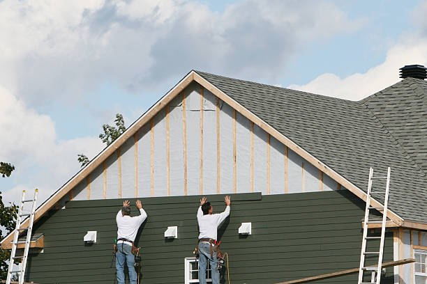 Professional Siding Replacement technician working in Springdale, OH
